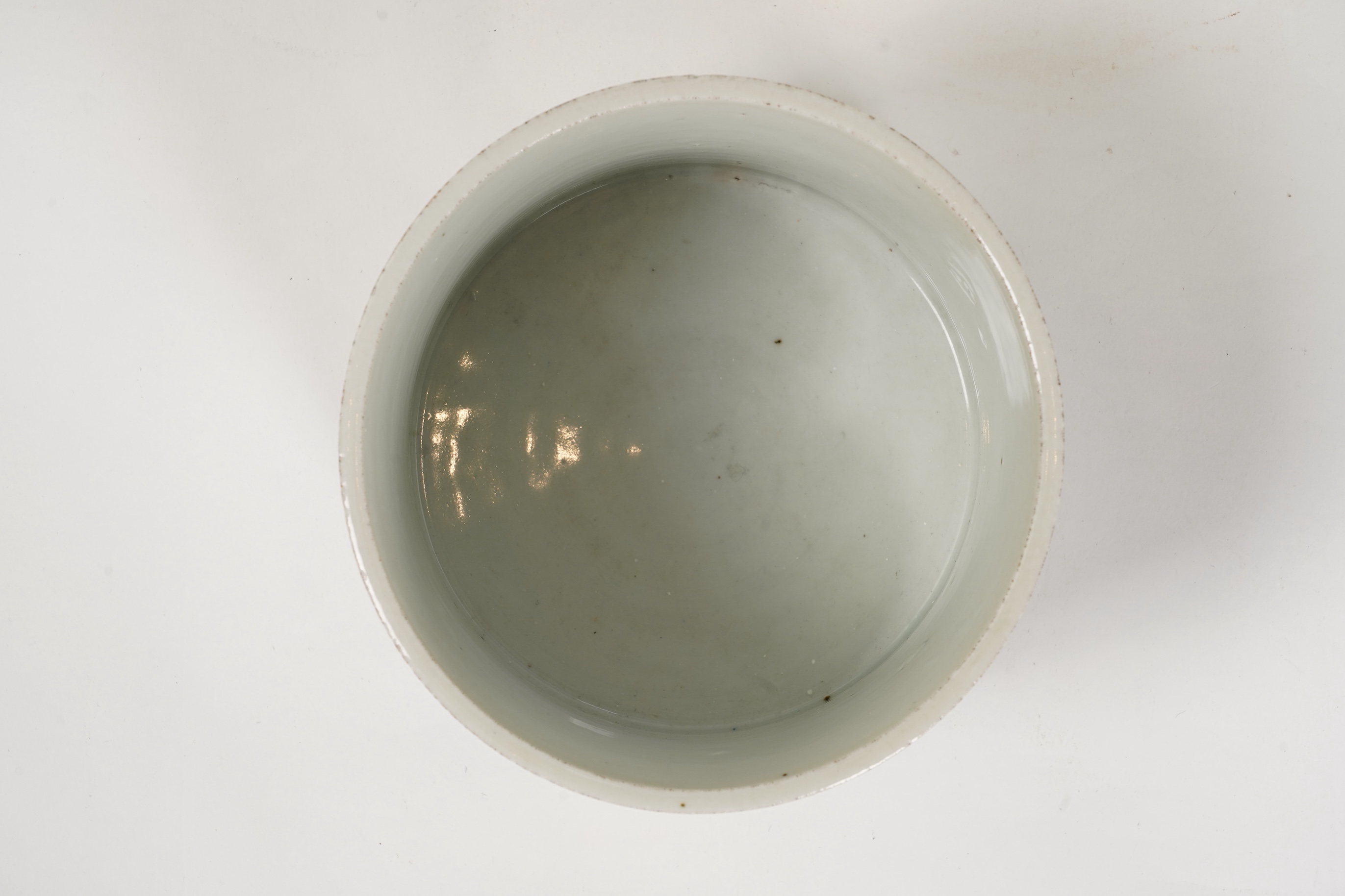 A Chinese underglaze blue and copper red inscribed brush pot, possibly Kangxi period